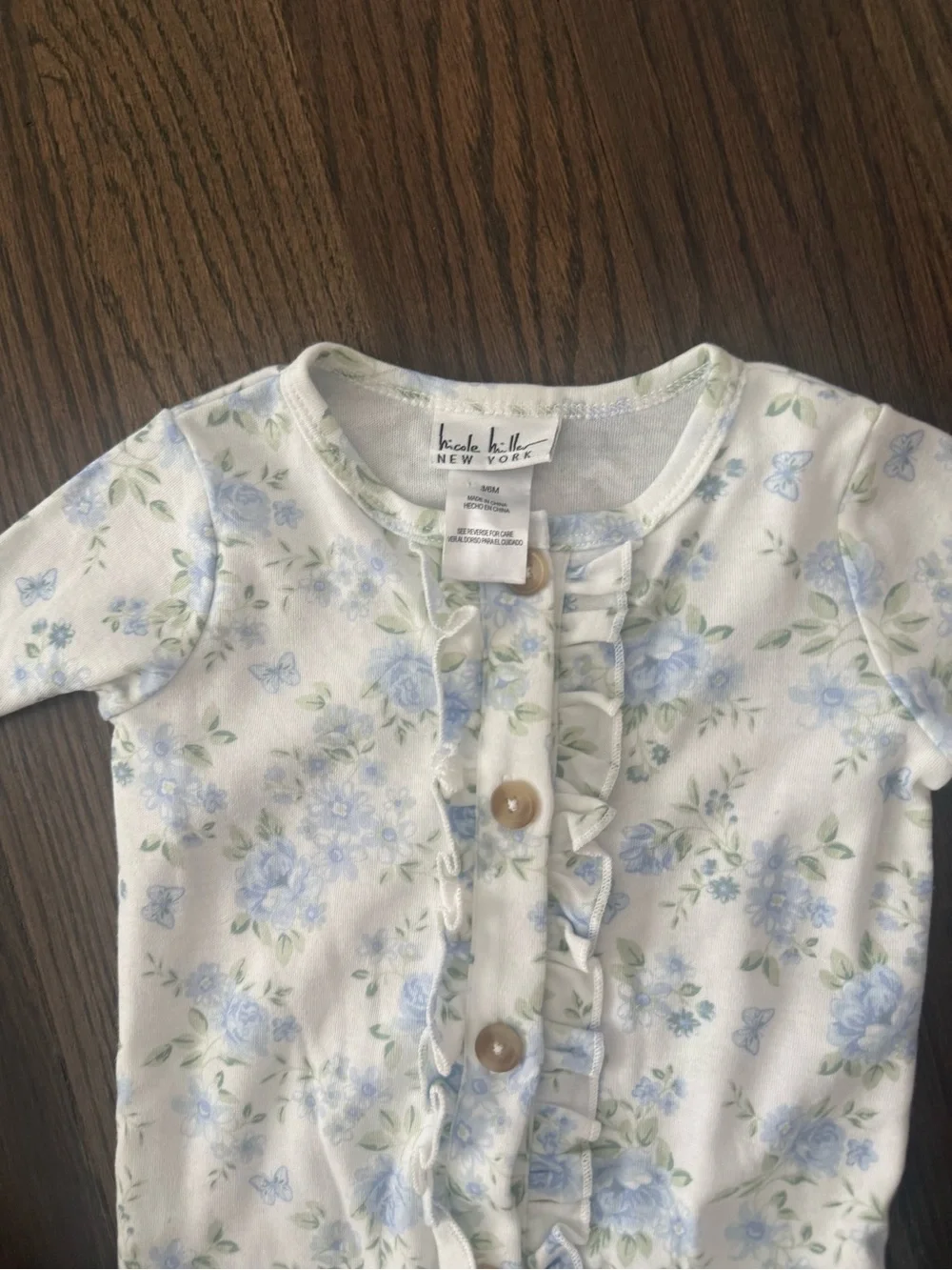 Nicole Miller Pale Blue Floral Ruffle-Front Footed One-Piece